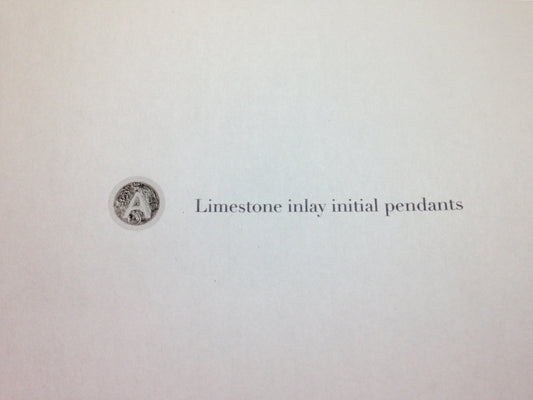 Initial limestone inlay