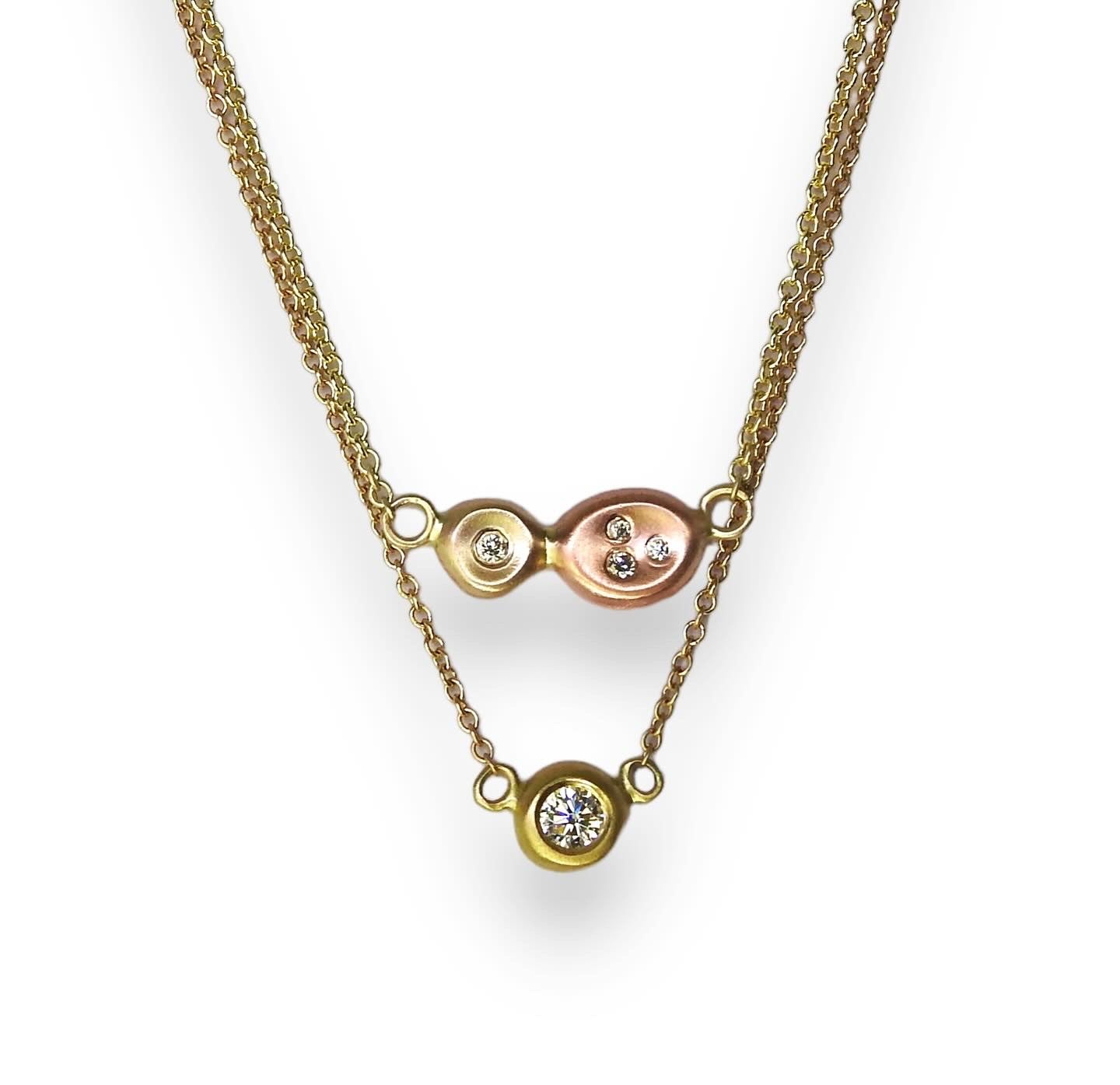 Diamonds in the rough: two tone yellow, and red gold organic pebbles, with scattered diamonds gypsy set in, handing on an 18" 10kt yellow gold cable chain, by ZEALmetal, Nicole Horlor, in Kingston, ON, Canada