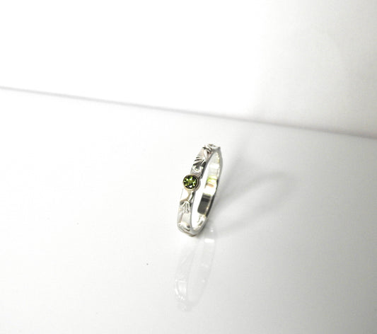 Blossom with yellow gold bezel and tourmaline