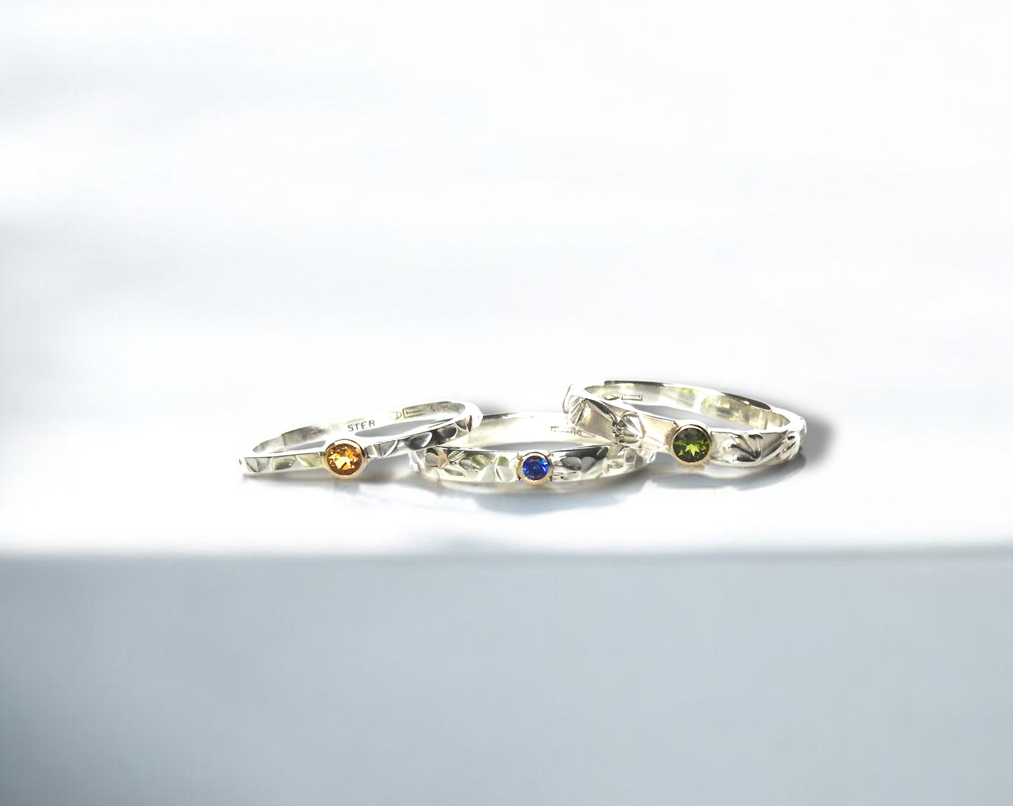 Leaf stamped band with yellow gold bezelled citrine