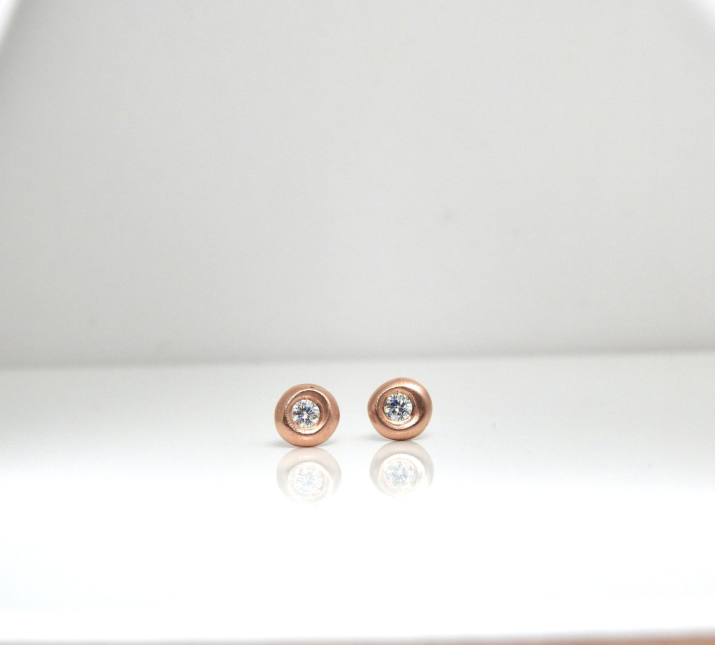 Diamonds in the rough stud earrings