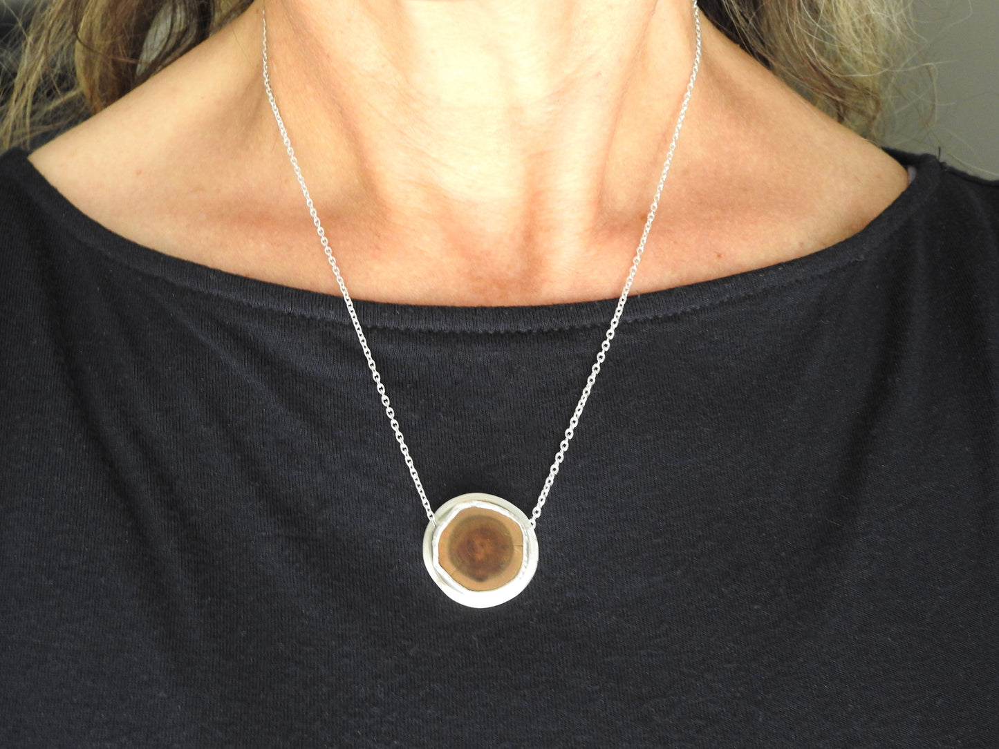 Driftwood found on the shores at Lemoine Point. Nostalgic driftwood floater pendant in sterlings silver. By ZEALmetal, Nicole Horlor, Kingston, ON, Canada.