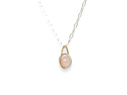Floating rose quarts sphere pendant with gold drop shape link, sterling silver centre round link gently holding an un-drilled 8.5 mm rose quartz stone, free floating emphasizing space and freedom., by ZEALmetal, Nicole Horlor, in Kingston, ON, Canada