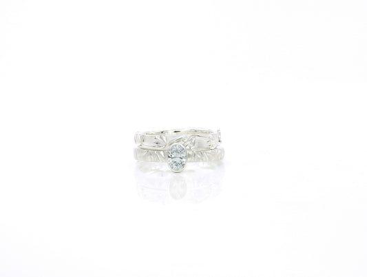 Into the woods band with oval bezel set diamond
