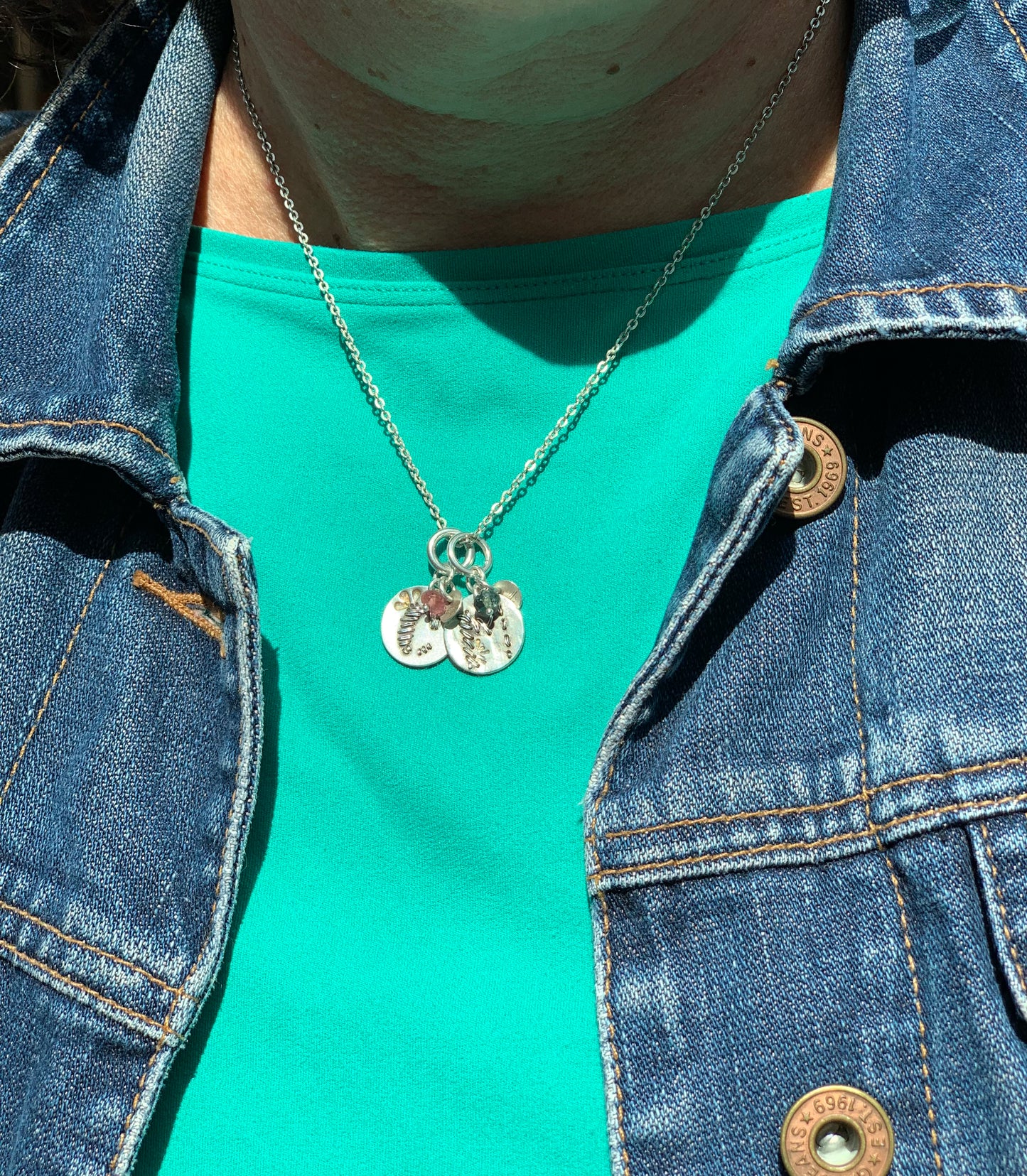 Stackable Initial pendants ~ Needle point in fine silver and sterling silver with a hint of 23kt gold, faceted pink tourmaline and NH tag. Canadian handmade in Kingston ON