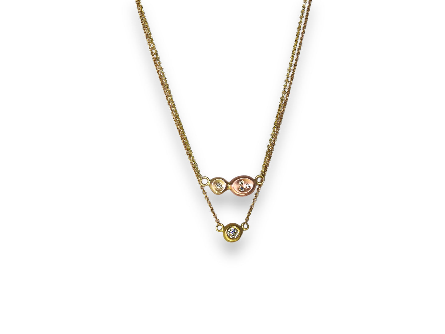 Diamonds in the rough: two tone yellow, and red gold organic pebbles, with scattered diamonds gypsy set in, handing on an 18" 10kt yellow gold cable chain, by ZEALmetal, Nicole Horlor, in Kingston, ON, Canada