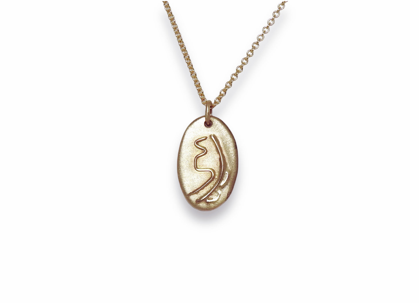 14kt yellow gold pebble pendant with 14kt red gold fire serpent symbol on one side and on the other side is Sei He Ki symbol in yellow gold wire, by ZEALmetal, Nicole Horlor, in Kingston, ON, Canada
