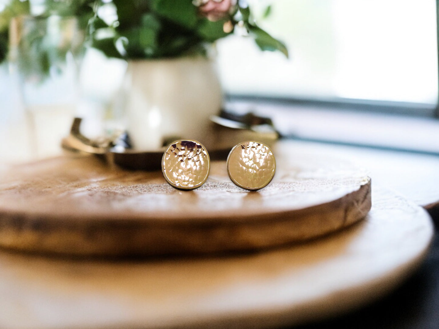 Luminous, dazzling sun disc studs, with a planish finish that reflects and sparkles, planish disc earrings by ZEALmetal, Nicole Horlor, in Kingston, ON, Canada