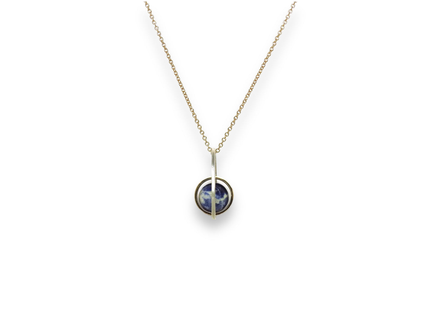 Worldly perspective: new pendant added to the Astral collection . 14 kt yellow gold band within sterling silver wire drop shape holding a free floating worldly looking sodalite undrilled sphere bead. on 14kty 18" cable chain, by ZEALmetal, Nicole Horlor, in Kingston, ON, Canada