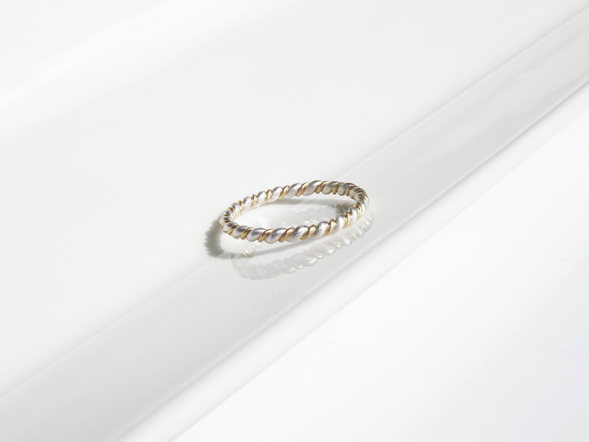 Two tone yellow and white gold twist rings, waved, matte finish, by ZEALmetal, Nicole Horlor, in Kingston, ON, Canada