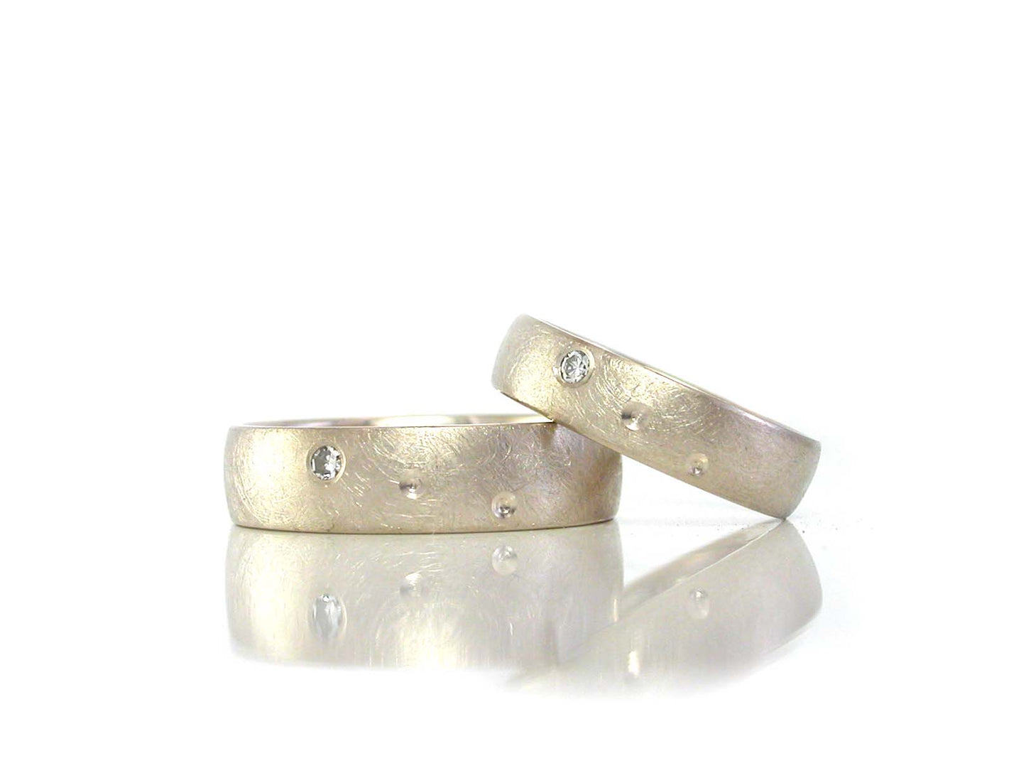 Canadian Handmade unique custom wedding bands, engagement rings, diamonds rings, gold rings, platinum rings, sapphire rings, ruby rings, pearl rings, sterling silver rings, in Kingston, Ottawa, Toronto, Ontario, British Columbia, US, New York, California, L.A.