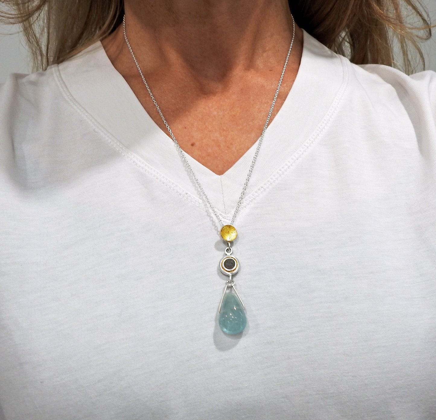 Sterling silver , 23kt gold leaf, limestone inlay, aquamarine, pendant, by ZEALmetal, Nicole Horlor, Kingston, ON, Canada