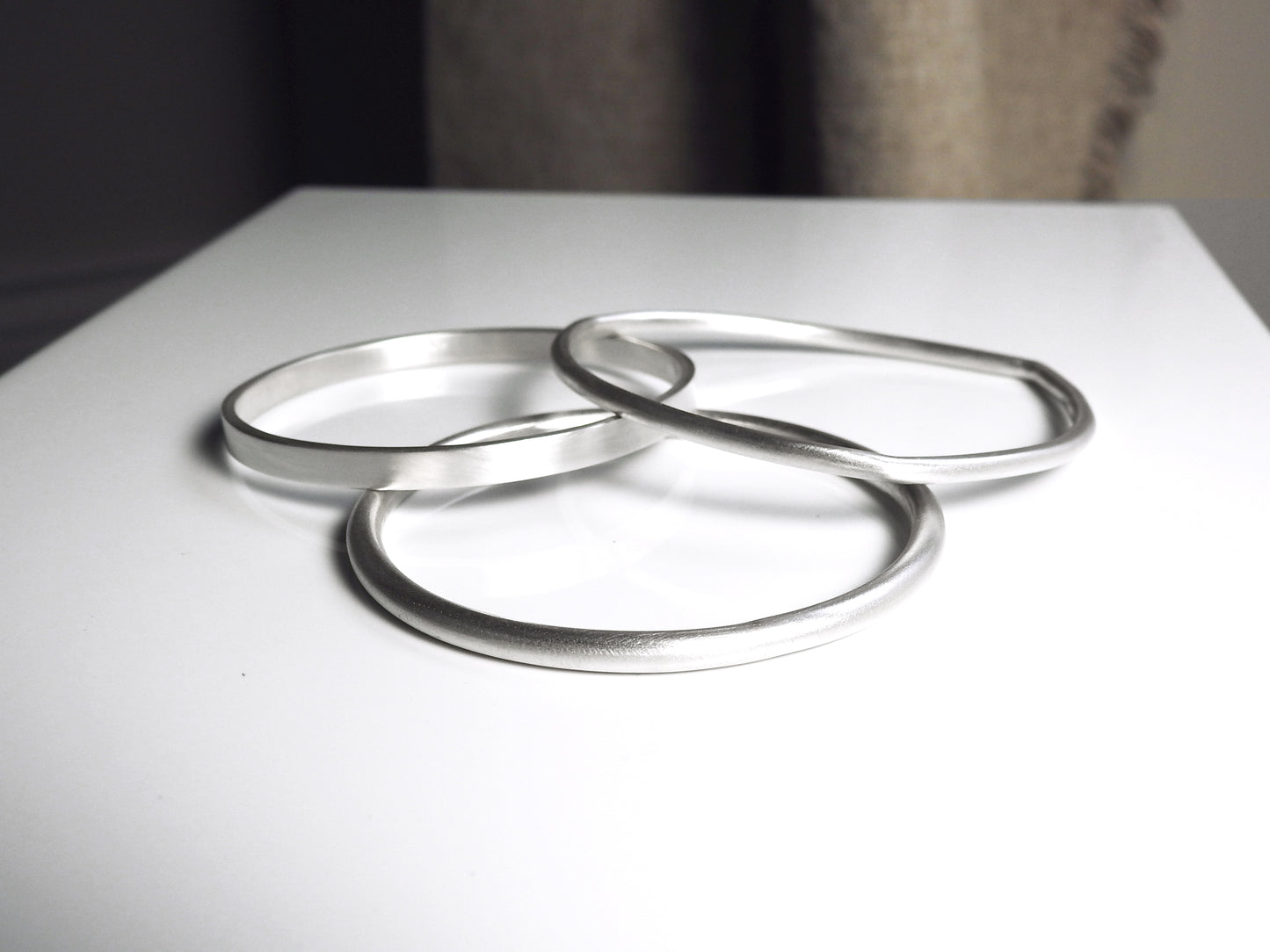 Bangles, bracelets, personalized jewellery, made from 100% recycled silver, gold, platinum and palladium precious metals, by ZEALmetal, Nicole Horlor, in Kingston, ON, Canada