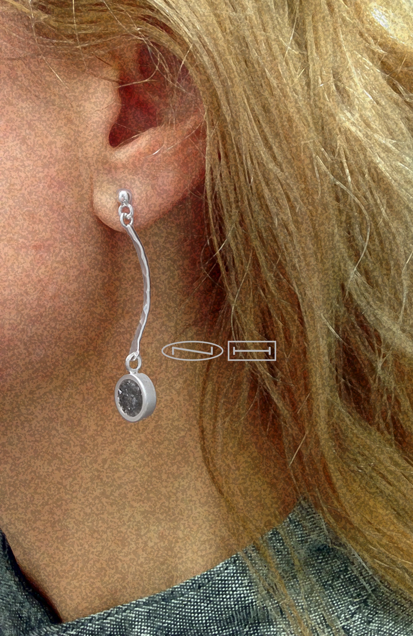 Curved limestone inlay dangle