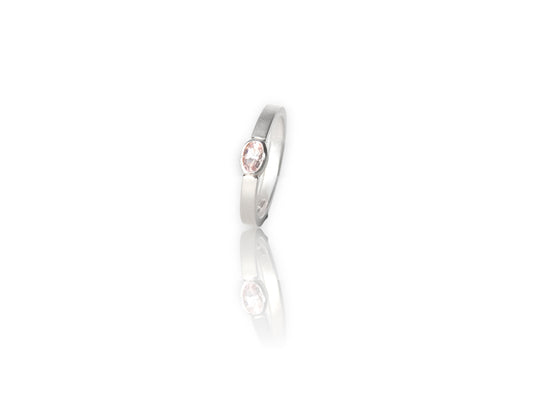 Floating Bezel ~ lovely clean flush bezel setting in band  in sterling silver with 3x5 oval morganite facetted stone.