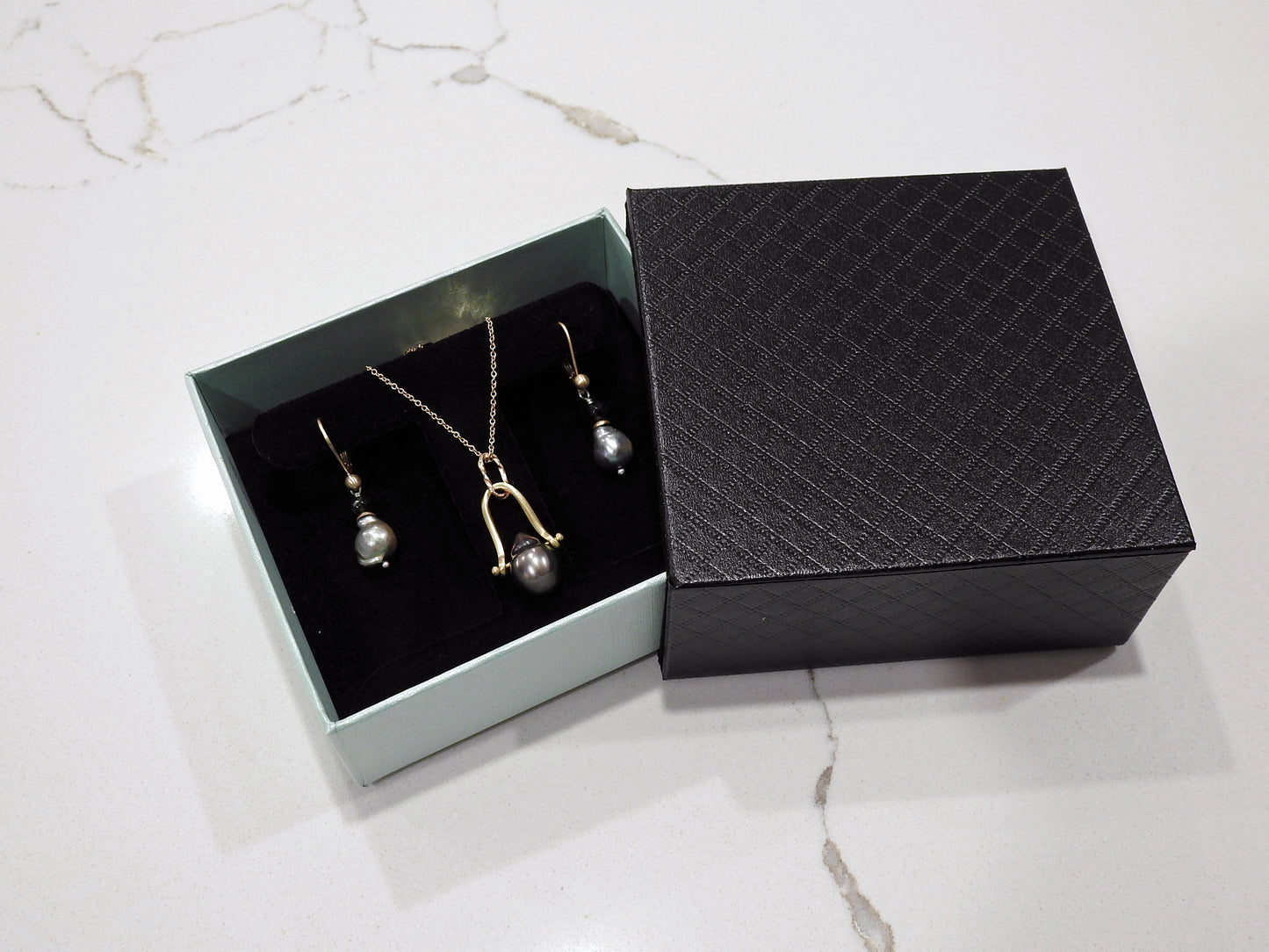 Grey/green baroque with tourmaline