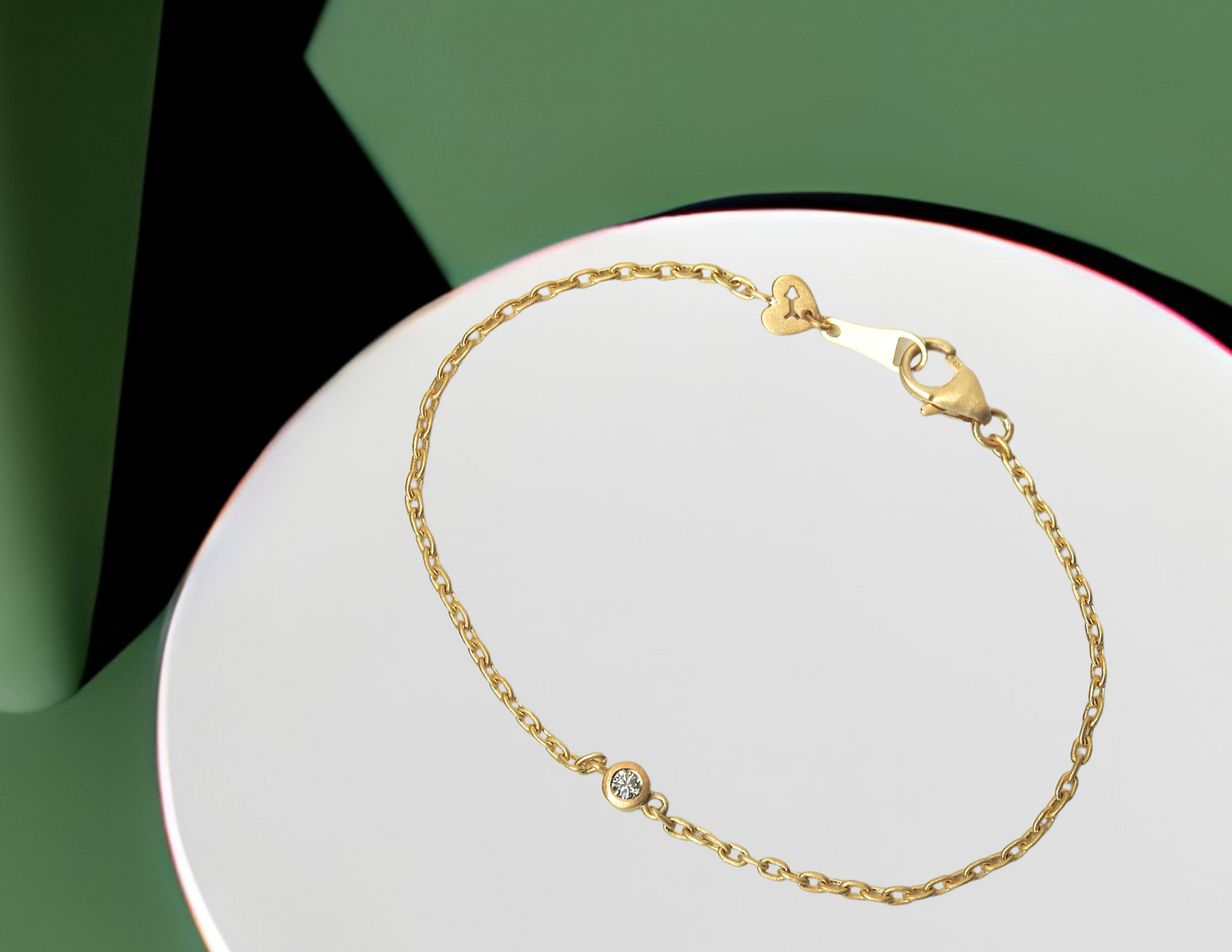 HEARTS AND ARROWS diamond bezel set bracelet in 18kt yellow gold, with an elegant 1.5mm cable chain, 8 x 4.7mm lobster clasp, and small hearts and arrows tag.  by ZEALmetal, Nicole Horlor, in Kingston, ON Canada