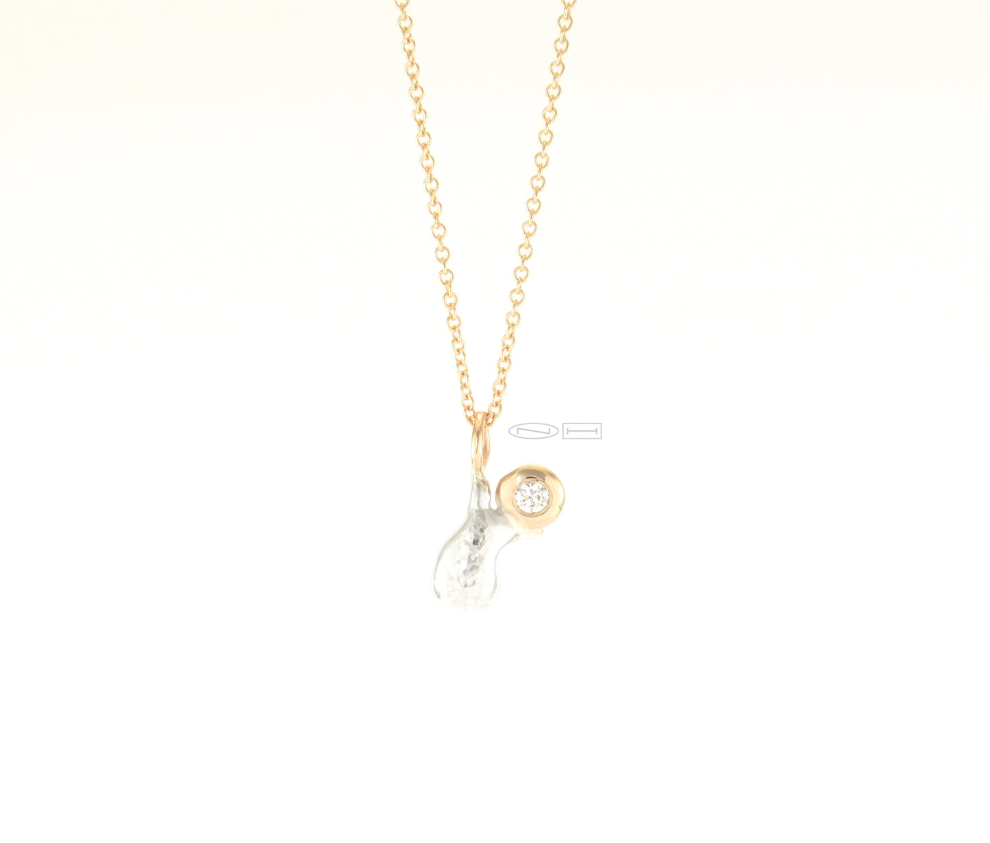 Canadian handmade by ZEALmetal in Kingston ONJoy ~ 14kt yellow gold, sterling silver, with 5pt round brilliant cut diamond. On a 14kt yellow gold 16" cable chain. Joy is a free spirit with a clear view...