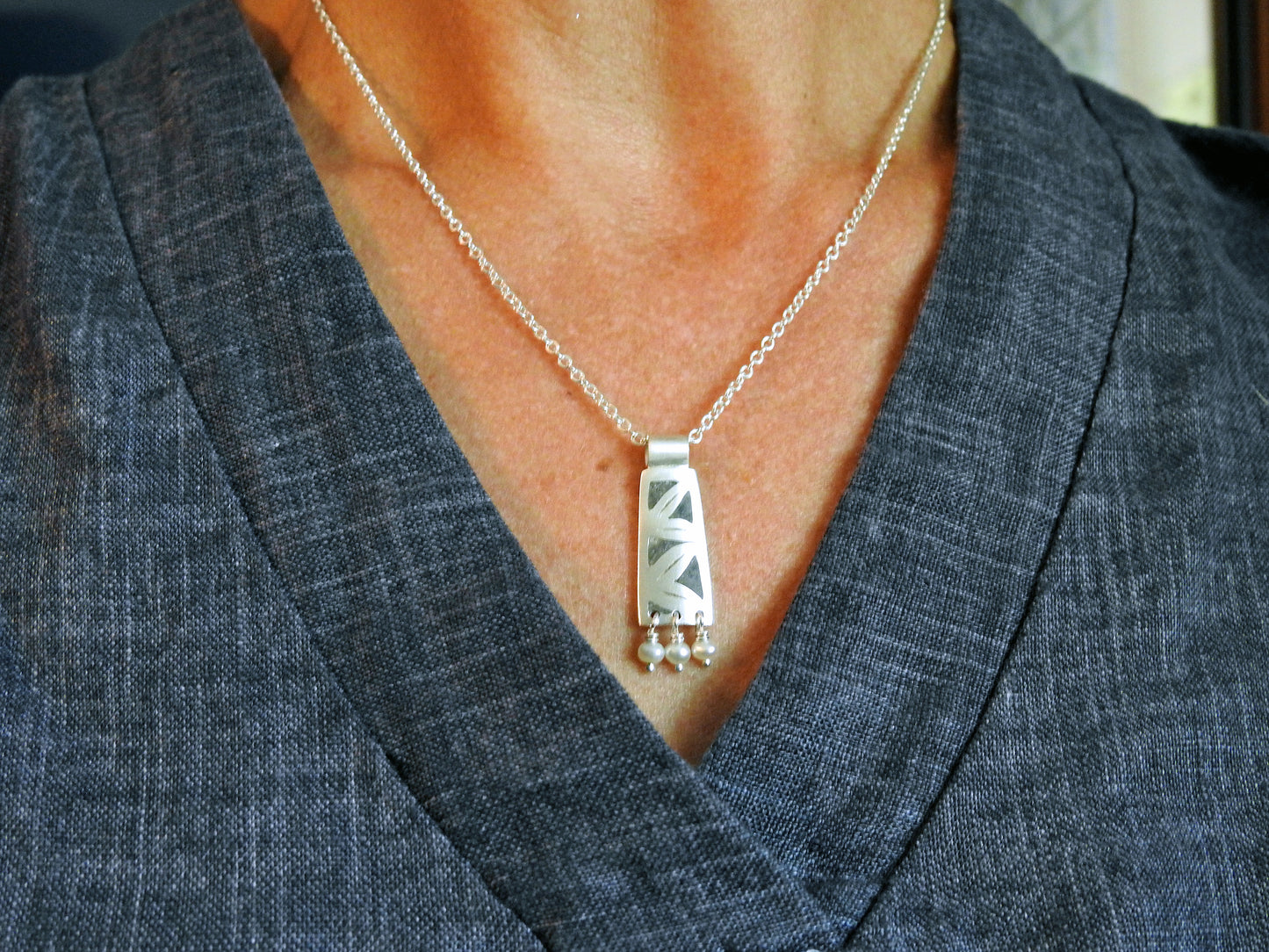 Limestone inlay pendant by ZEALmetal, Nicole Horlor, Kingston, ON, Canada