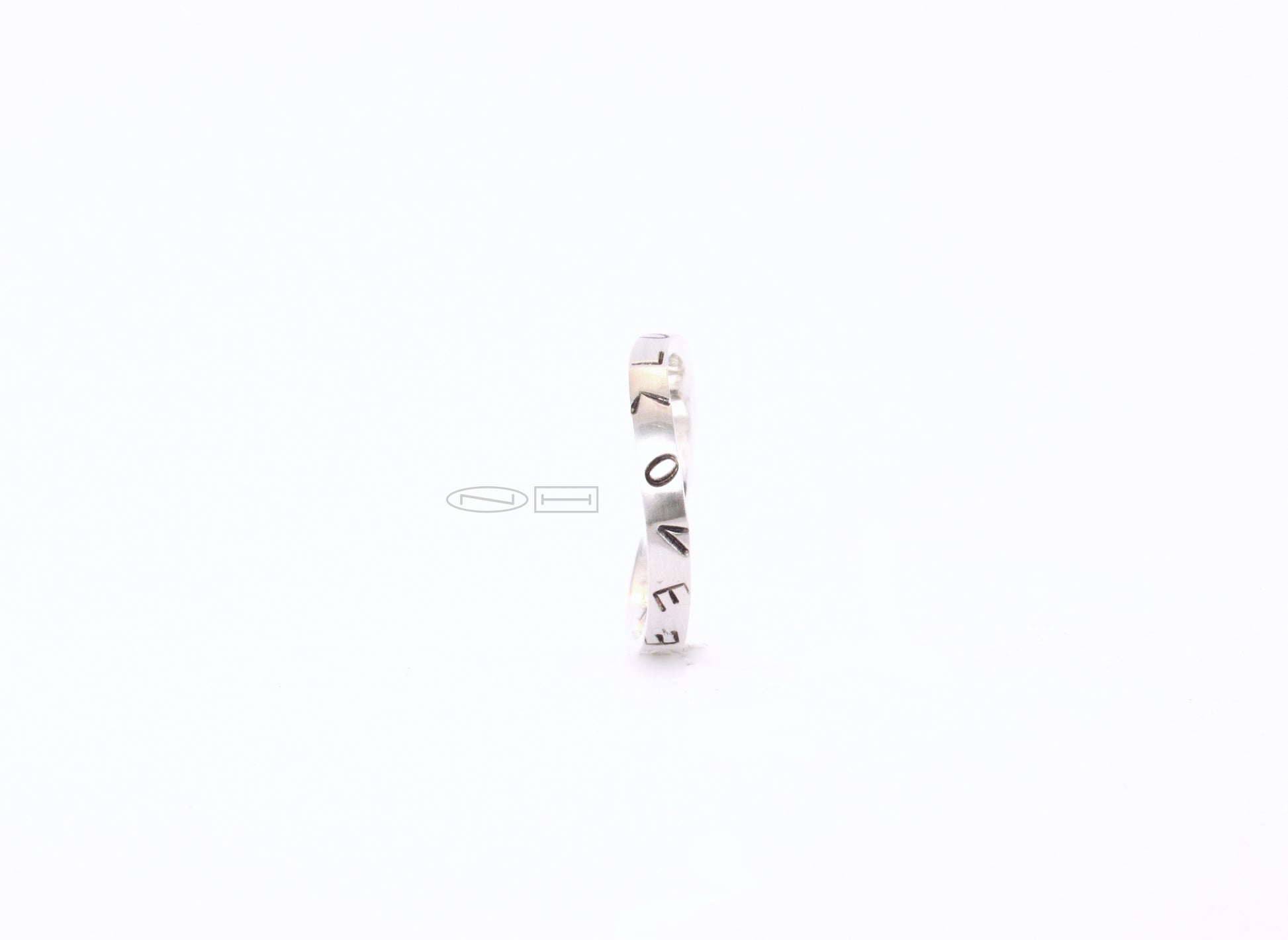 Graffiti stacker rings made from 100% recycled silver and gold, by ZEALmetal, Nicole Horlor, in Kingston, ON, Canada