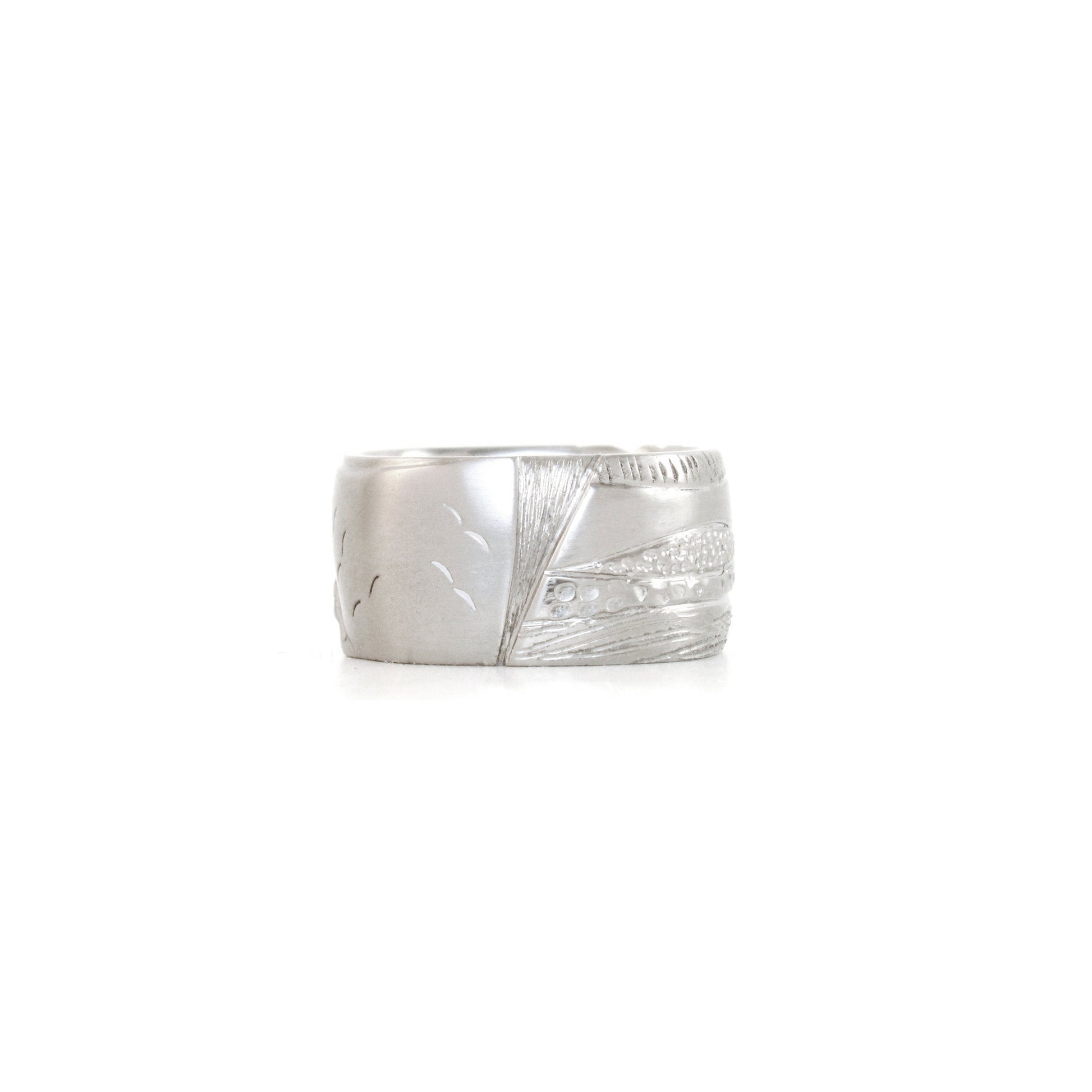 Nature inspired hand carved wedding bands by ZEALmetal, Nicole Horlor, in Kingston, ON, Canada