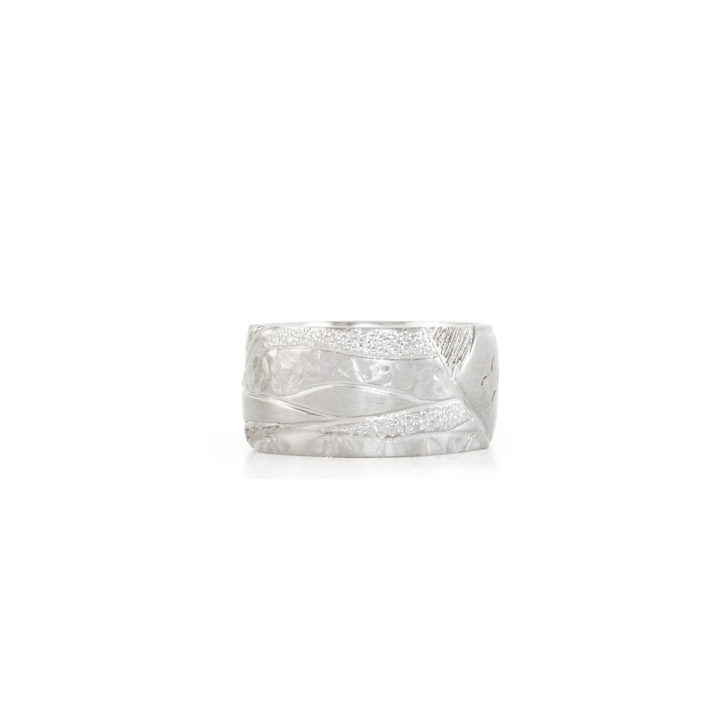 Nature inspired hand carved wedding bands by ZEALmetal, Nicole Horlor, in Kingston, ON, Canada