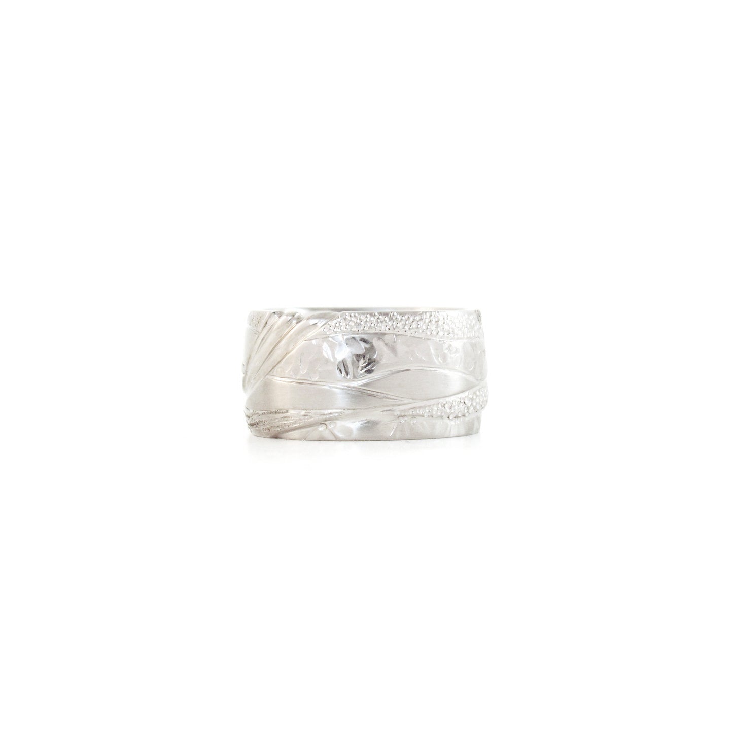 Nature inspired hand carved wedding bands by ZEALmetal, Nicole Horlor, in Kingston, ON, Canada