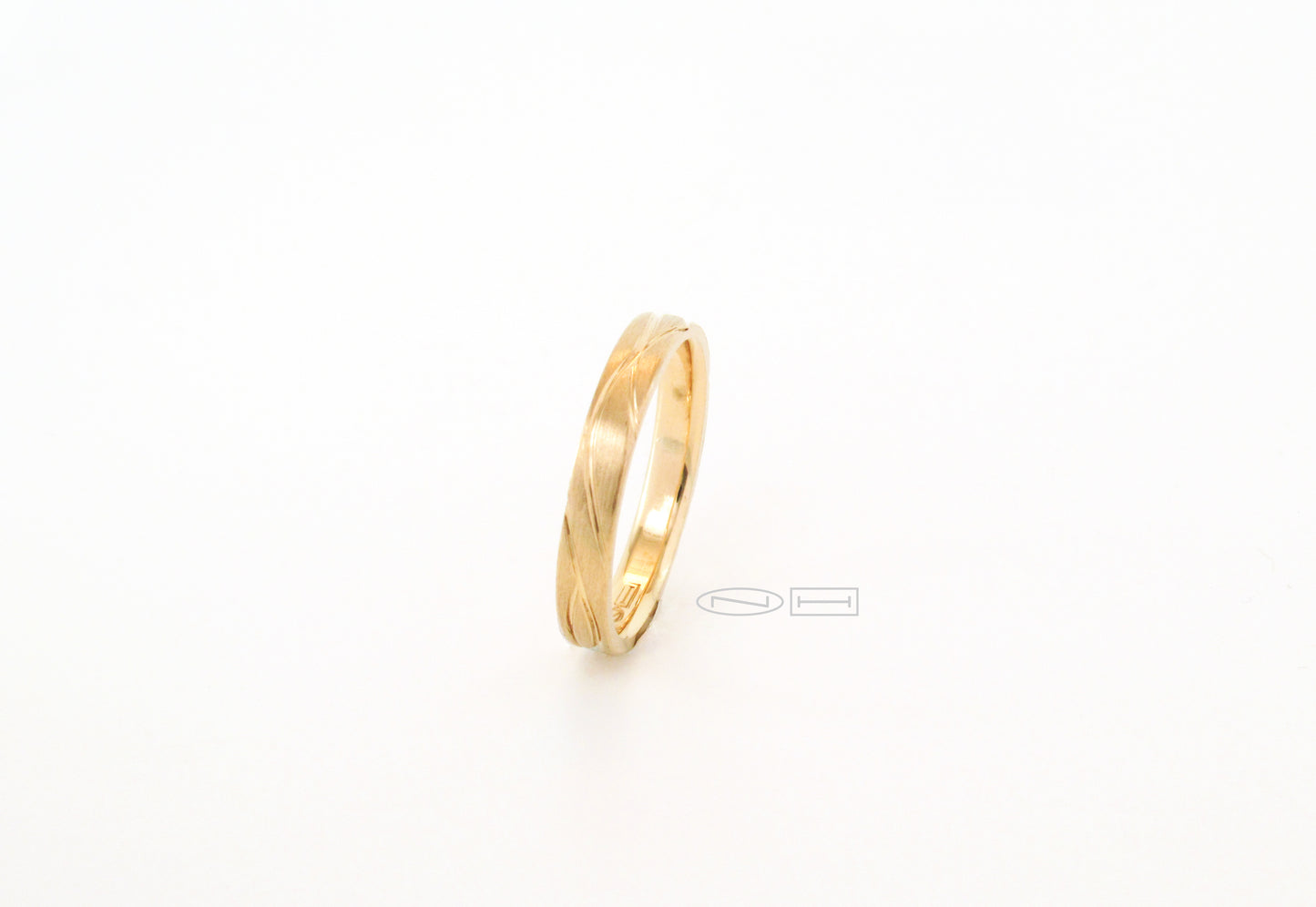 Organically you 3mm hand carved, comfort fit gold stacker. Matte finish with high polish carving and interior Available in 18kt, or 14kt yellow, white, or red gold and platinum.