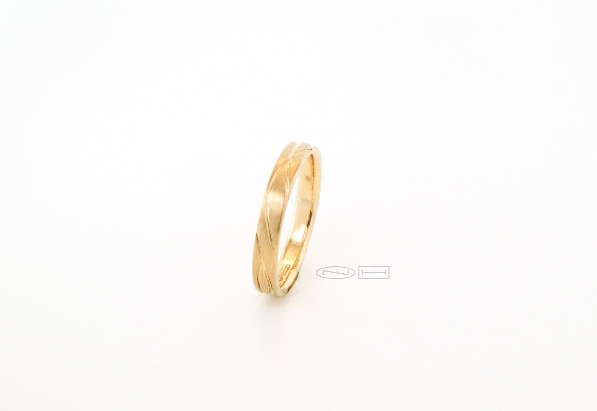 Organically you 3mm hand carved, comfort fit gold stacker. Matte finish with high polish carving and interior  Available in 18kt, or 14kt yellow, white, or red gold and platinum.
