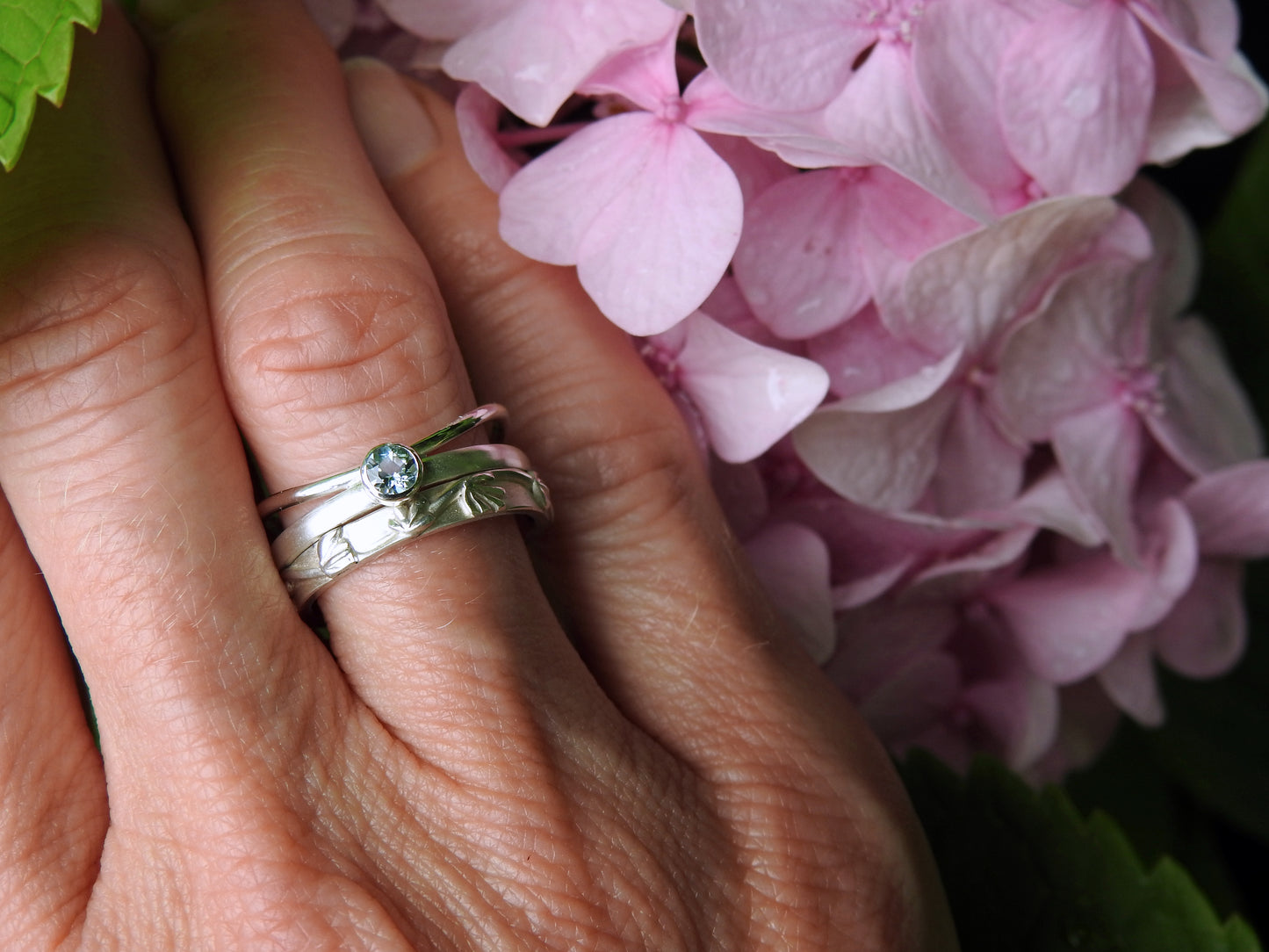 Ripple ring with sky blue topaz