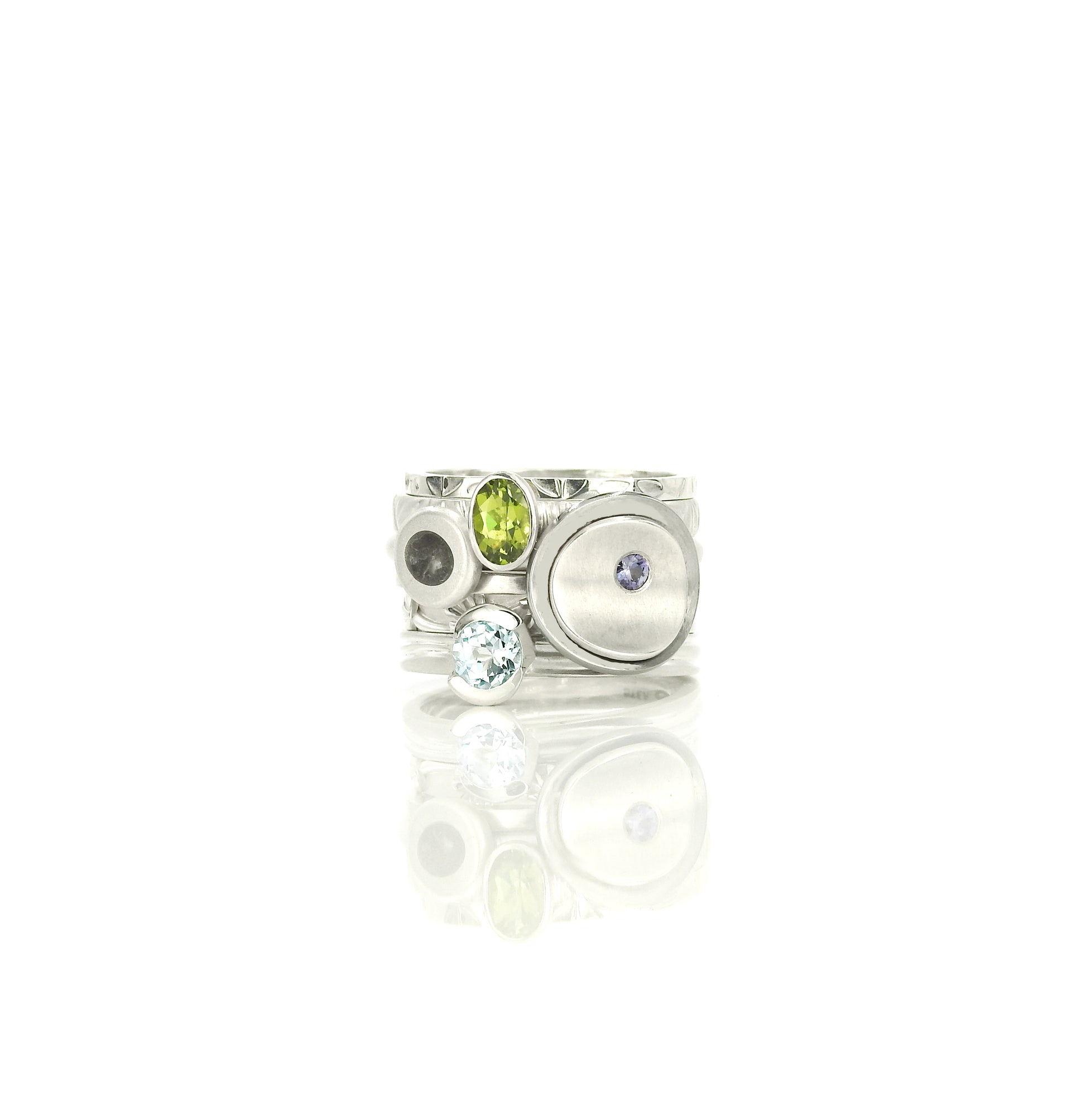 Limestone inlay pebble stacker ring, peridot stacker ring, sky blue topaz stacker ring, blossom stacker ring, leaf stacker ring,  by ZEALmetal, Nicole Horlor, in Kingston, ON, Canada