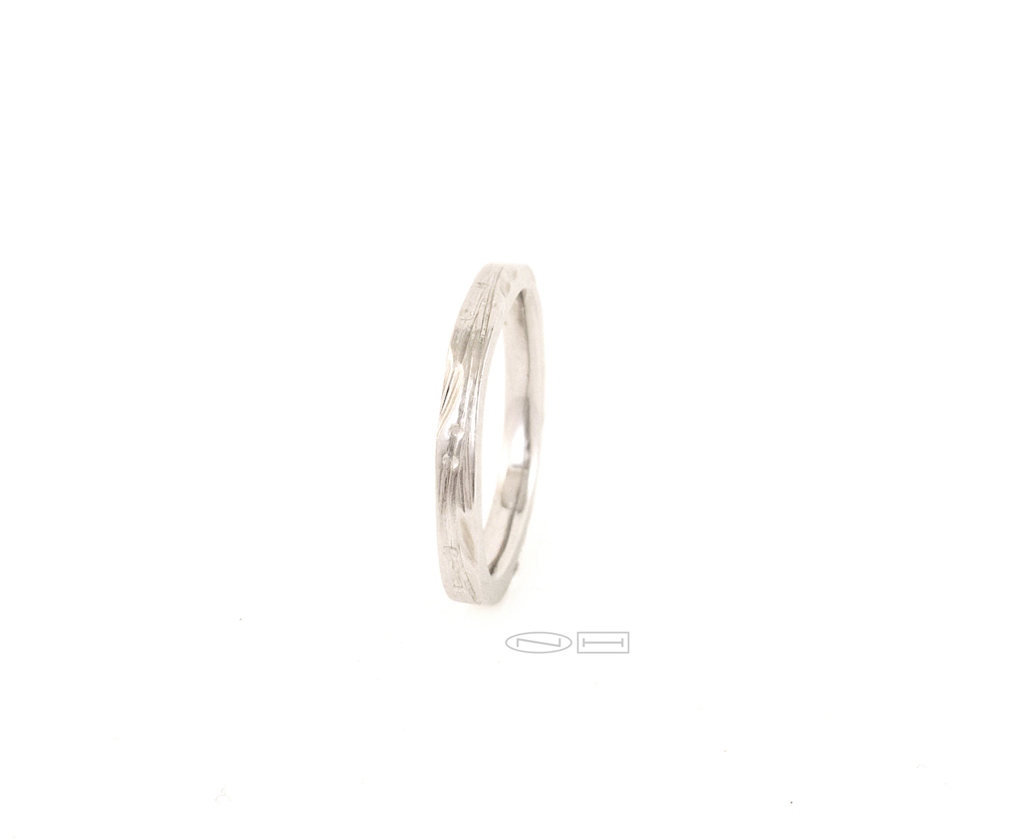 Leaf and vine soft shaped square ring or round with carved vines and stamped leaves, 2.5 m/m width Available in sterling silver, 18kt or 14kt Gold, and platinum by ZEALmetal, Nicole Horlor, in Kingston, ON Canada