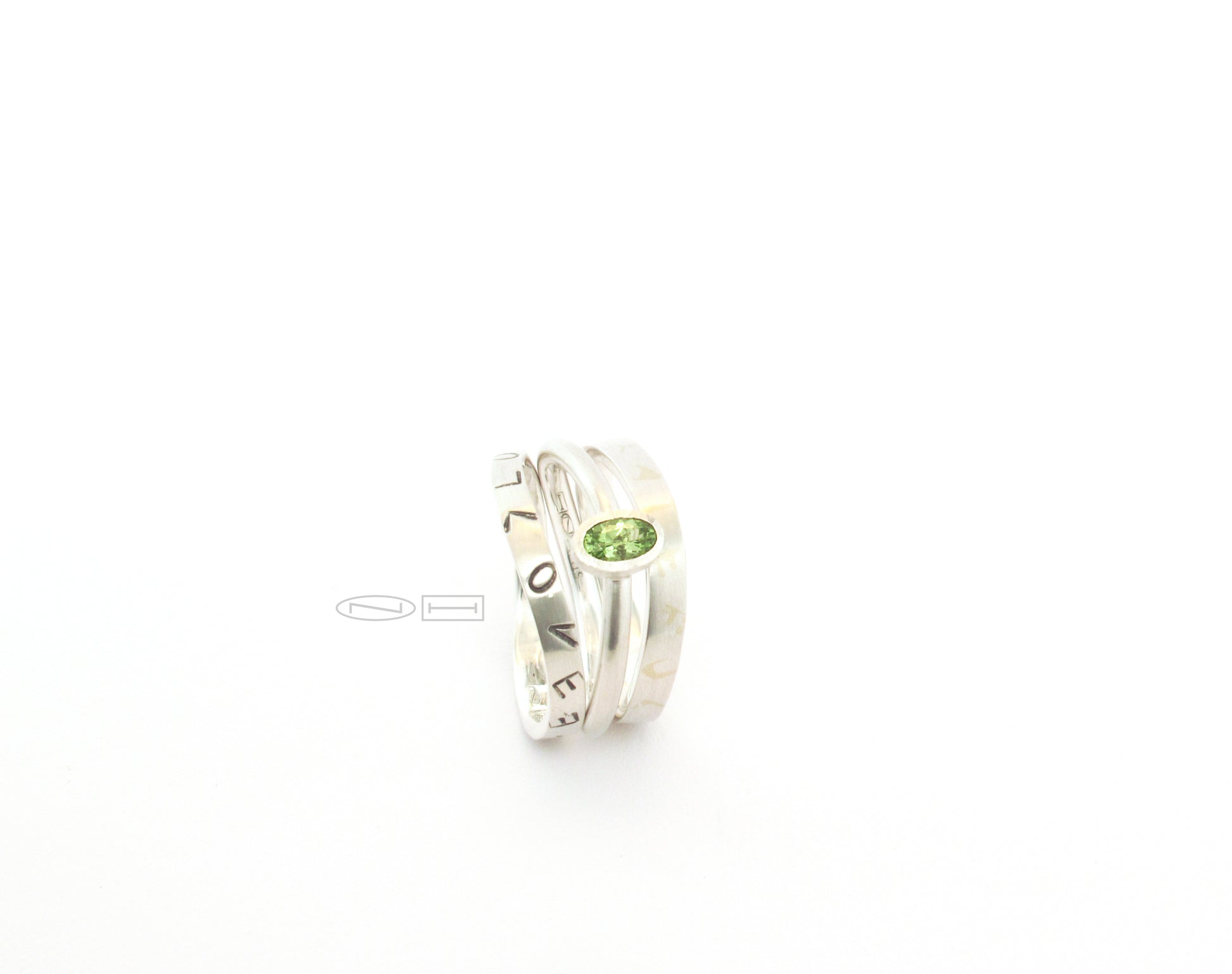 Graffiti stacker rings made from 100% recycled silver and gold, by ZEALmetal, Nicole Horlor, in Kingston, ON, Canada