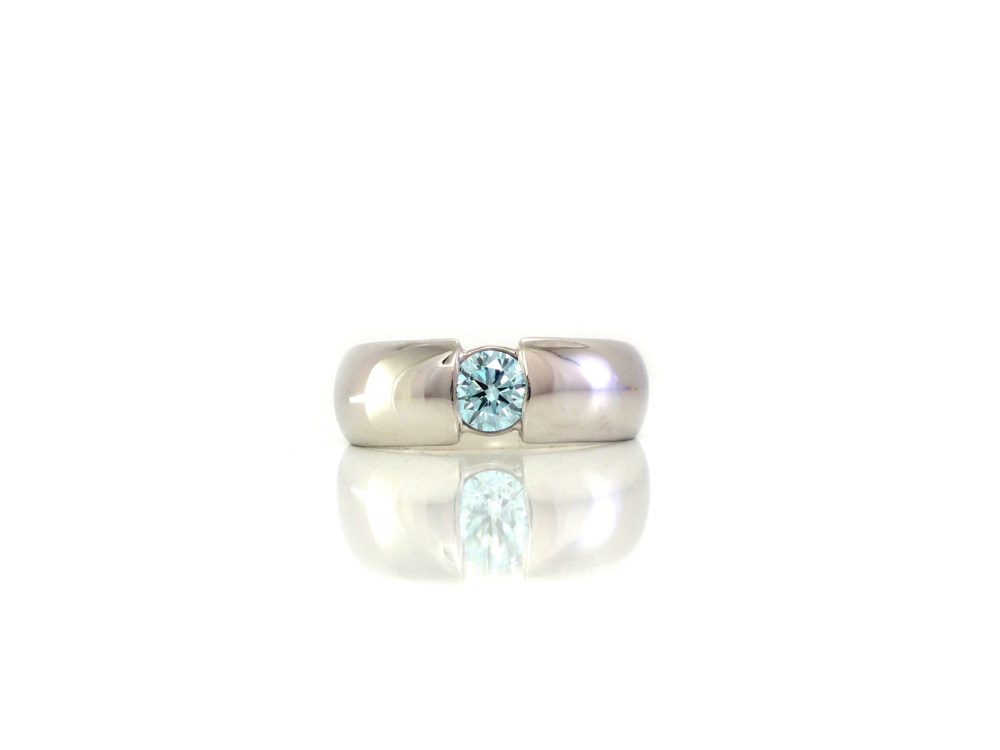 Faux tension with blue diamond in 18kt white gold by ZEALmetal, Nicole Horlor, in Kingston, ON, Canada