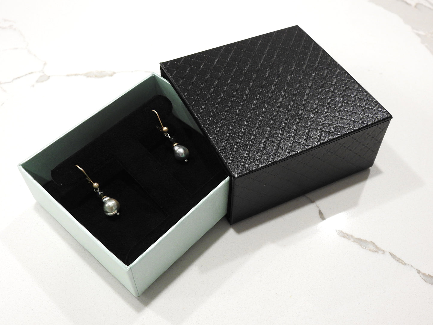 Grey/green baroque with tourmaline