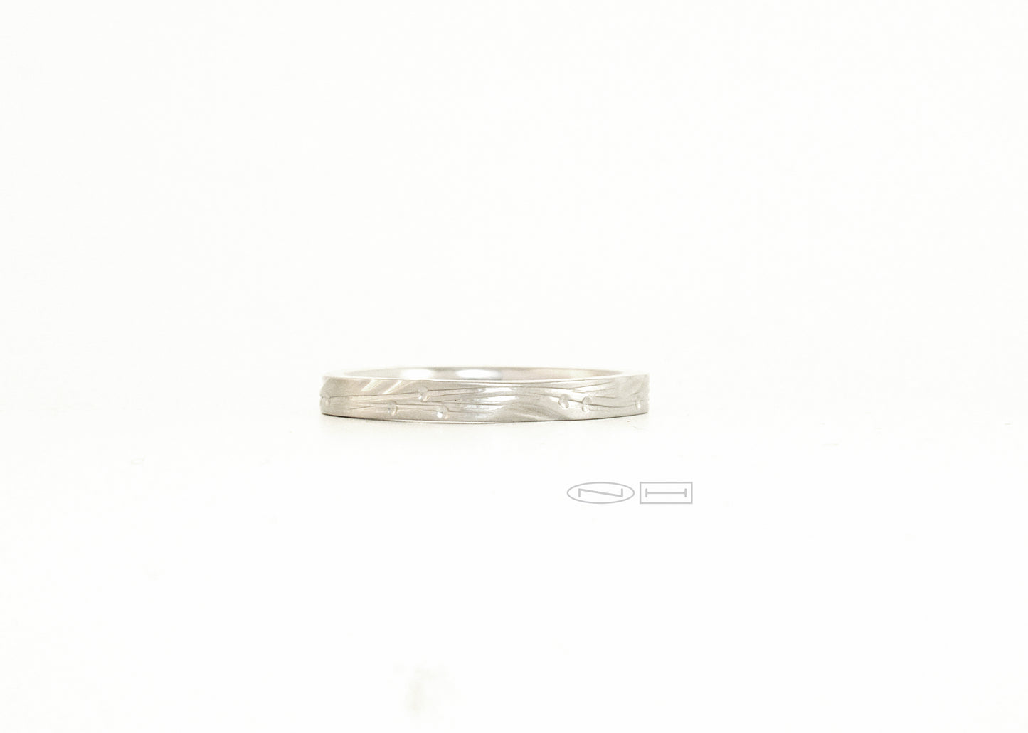 Leaf and vine soft shaped square ring or round with carved vines and stamped leaves, 2.5 m/m width Available in sterling silver, 18kt or 14kt Gold, and platinum by ZEALmetal, Nicole Horlor, in Kingston, ON Canada