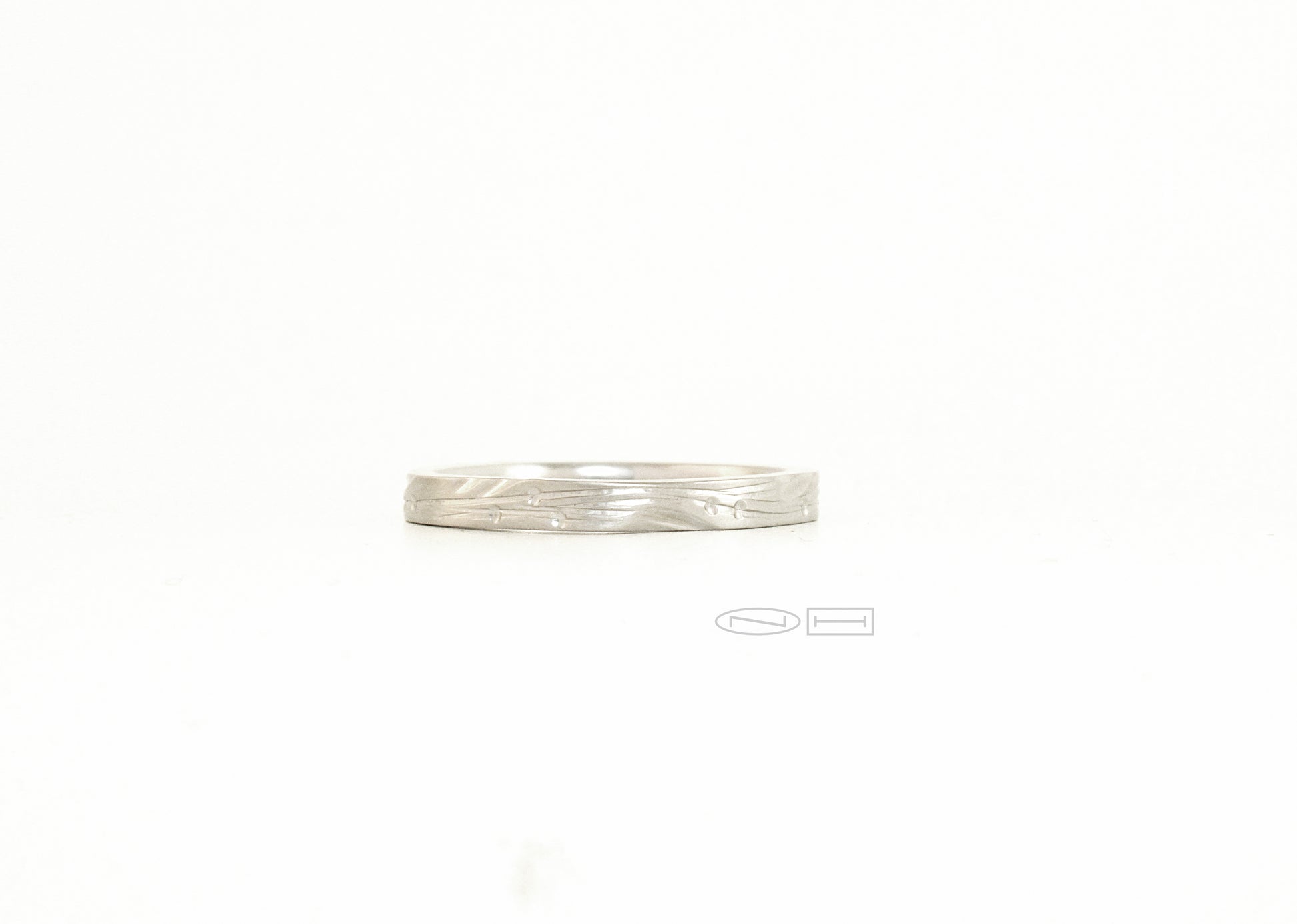 Leaf and vine soft shaped square ring or round with carved vines and stamped leaves, 2.5 m/m width  Available in sterling silver, 18kt or 14kt Gold, and platinum by ZEALmetal, Nicole Horlor, in Kingston, ON Canada