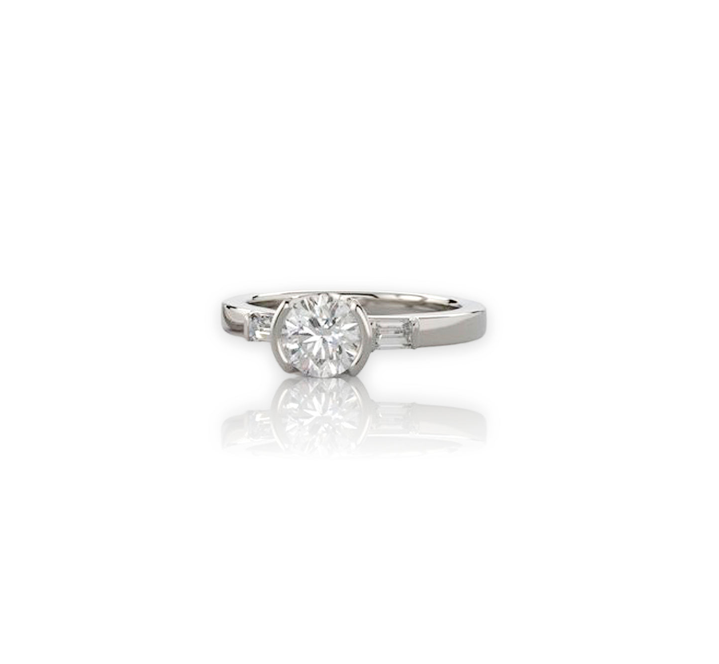 .70 F VS1 3 X EX round brilliant cut diamond with 3 x 2mm straight baguette diamonds VS GH White gold partial bezel ring with baguette side stones 6mm band size 7