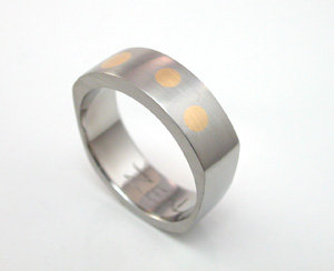 Tapered square With gold rivits