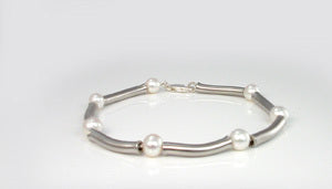 Steel and pearl braclet