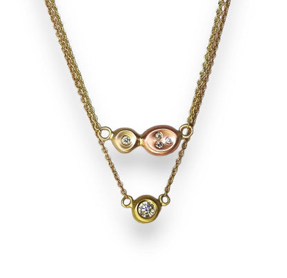 Diamonds in the rough: two tone yellow, and red gold organic pebbles, with scattered diamonds gypsy set in, handing on an 18"&nbsp; 10kt yellow gold cable chain, by ZEALmetal, Nicole Horlor, in Kingston, ON, Canada