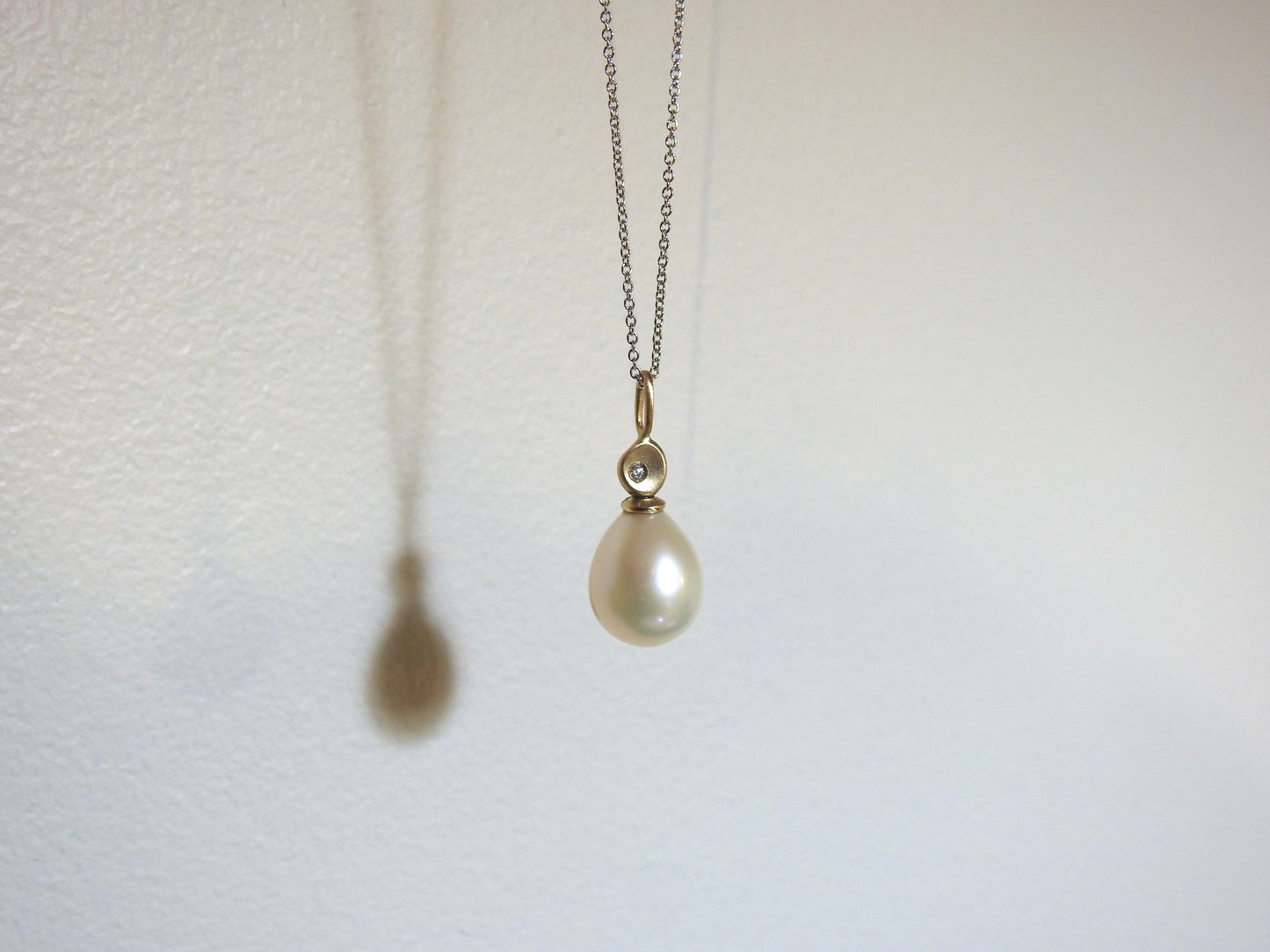 Diamonds in the rough with pear pearl