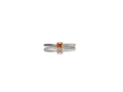 3mm princess cut orange sapphire in 18kt yellow gold bezel and 14kt 1.5mm width soft square shape band with matte finish., By ZEALmetal, Nicole Horlor