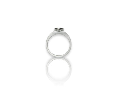 ZEALmetal classic planish bezel diamond ring with accent diamond side stones.