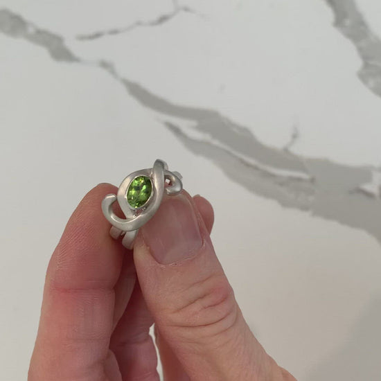 Video detail of peridot enfoldment ring by ZEALmetal, Nicole Horlor, in Kingston, ON, Canada