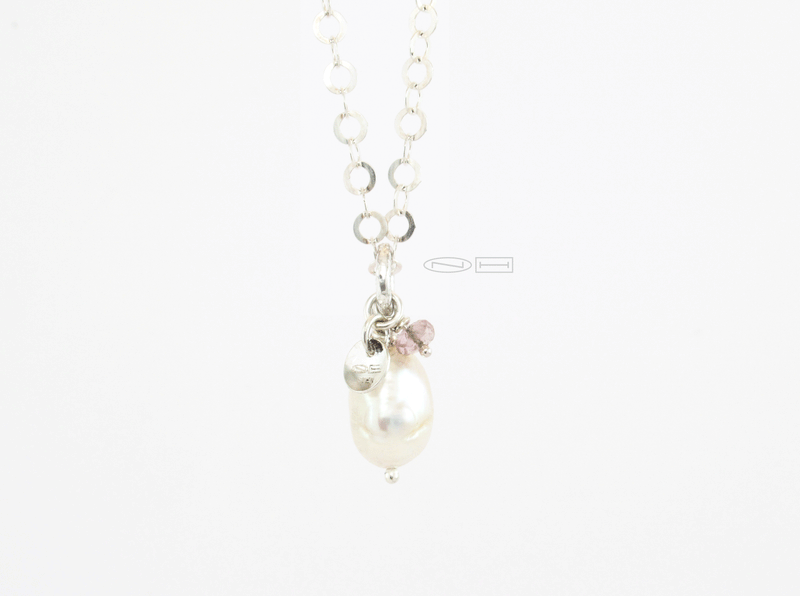 Stackable power pendants ~ White Baroque pearl ~ , handmade sterling silver planished bail with 13x9 unique white baroque pearl, small facetted tourmaline bead and NH logo tag.  Canadian handmade in Kingston ON