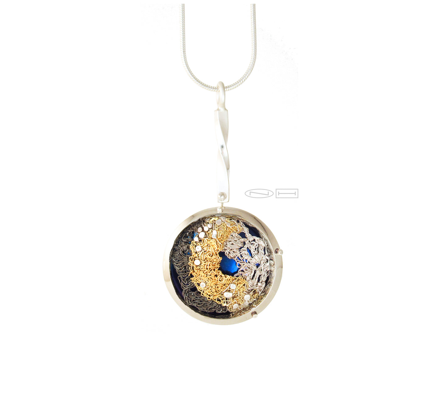 Handcrafted ~captured thought ~ 22kt yellow gold crochet, fine silver crochet, blacken crochet, stitched together, and placed upon an anodized titanium disc, framed in stainless steel, with sterling silver rivets, hanging from a twisted bail bar, with matte and high polish finish. Local Canadian handmade in Kingston, ON