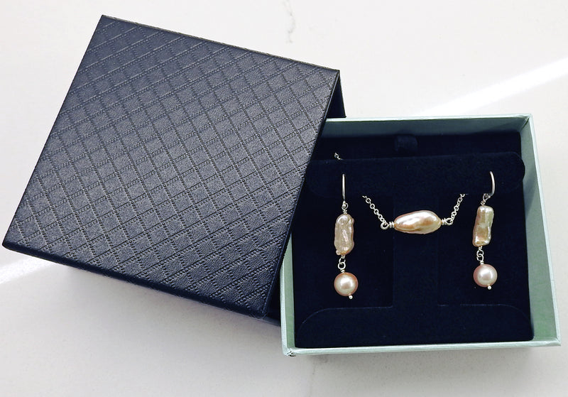 Elongated baroque cultured pearls tied with sterling silver wire, with 8.5mm round natural soft pink pearl drops, on sterling silver Shepard hooks. By ZEALmetal, Nicole Horlor, Kingston, ON, Canada