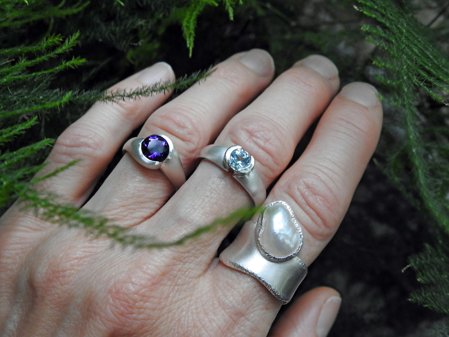 Rounded wrap bezel ring with Amethyst