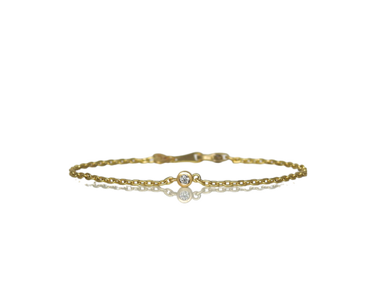 HEARTS AND ARROWS diamond bezel set bracelet in 18kt yellow gold, with an elegant 1.5mm cable chain, 8 x 4.7mm lobster clasp, and small hearts and arrows tag.  by ZEALmetal, Nicole Horlor, in Kingston, ON Canada